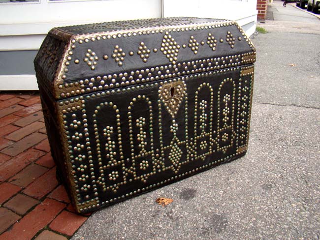 A late 18th or early 19th century brass decorated leather trunk with canted top — image 5